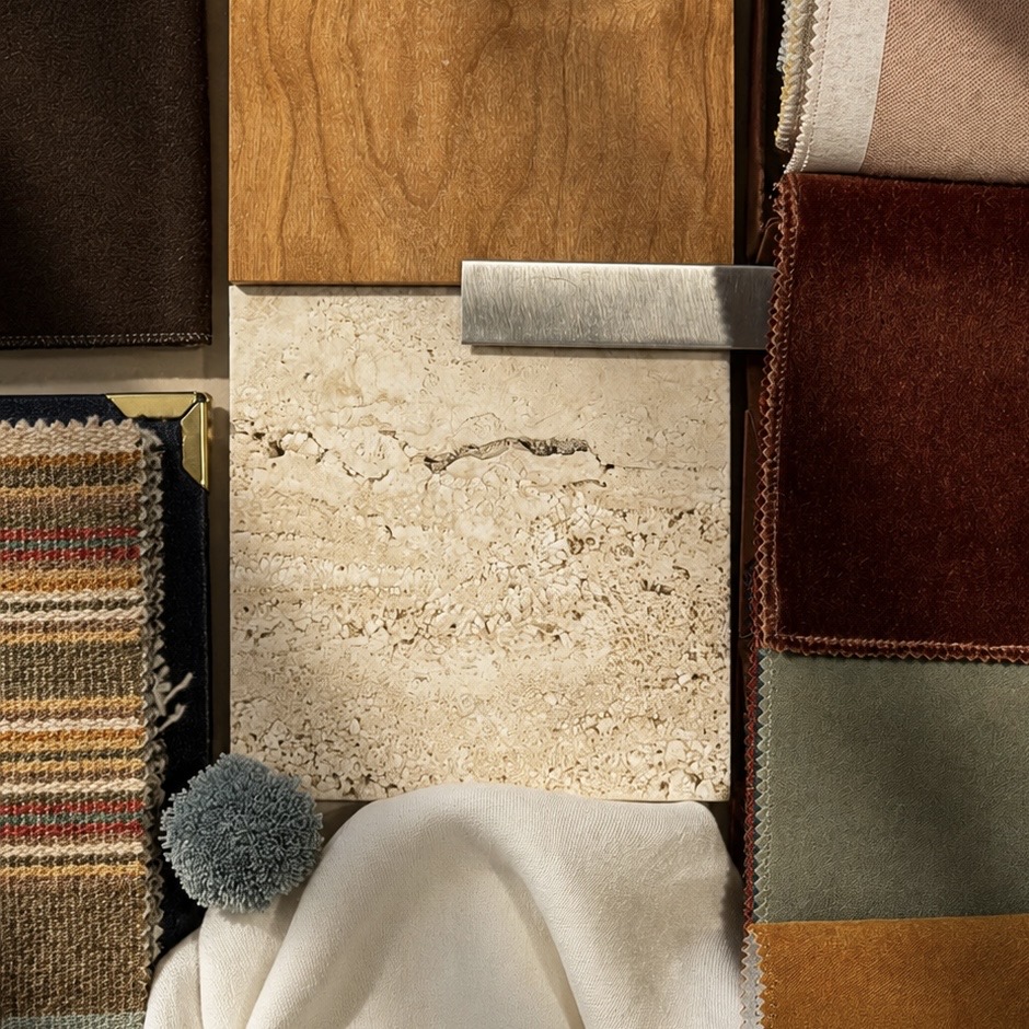 Curated material samples including wood, stone, textiles and metal finishes