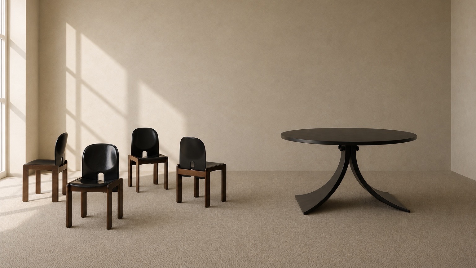 Dark wooden chairs beside a round table